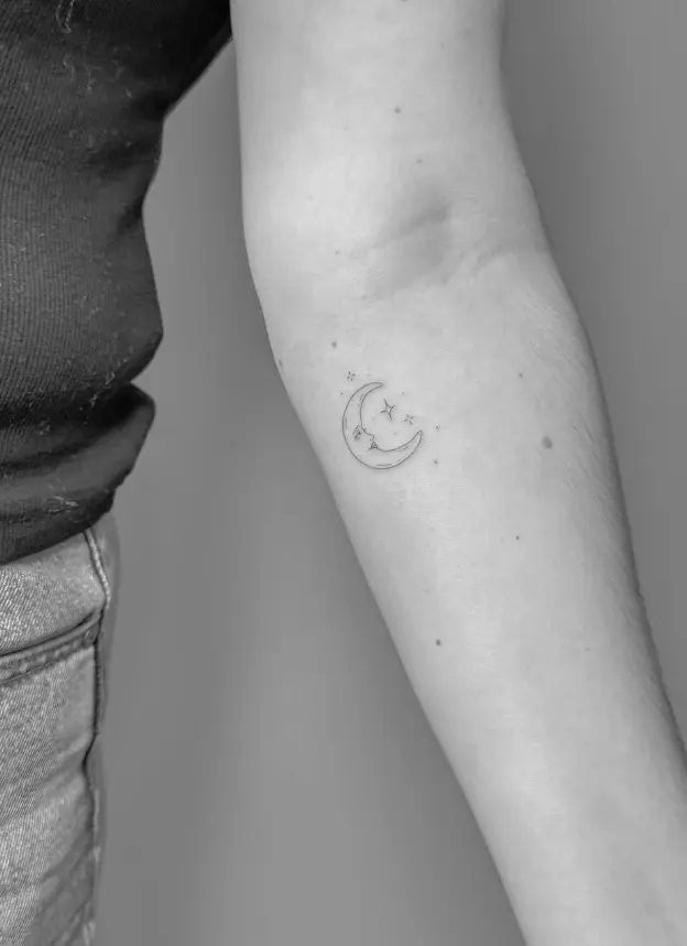 Moon and stars fine line tattoo with minimalist design by Chelsea.Q